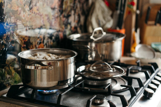 Cooking a Delicious Meal on a Warm Stovetop in a Cozy Kitchen