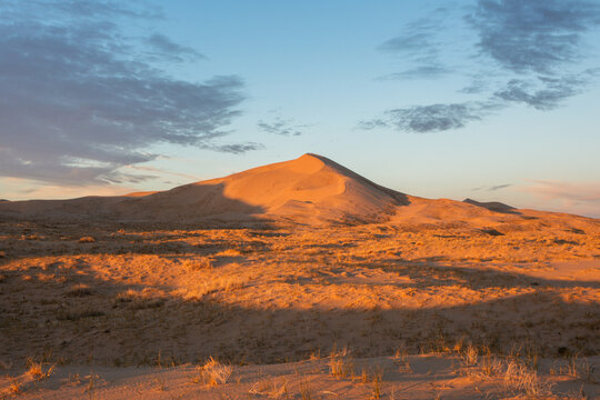 Remote Sand Dune at Sunset 