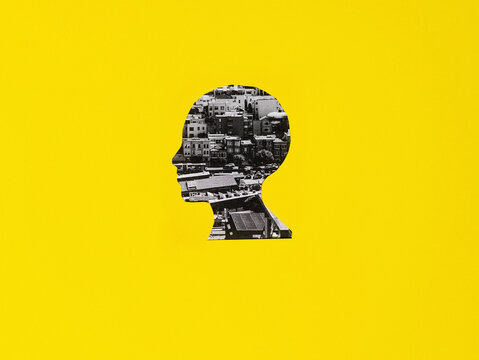 Analog collage anonymous head with city street.