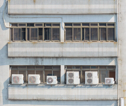 Urban building facade with air conditioning units