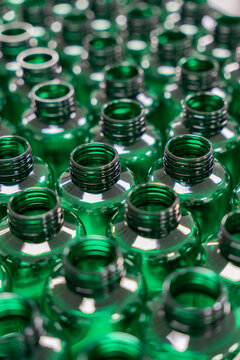 Green plastic bottles manufacturing recycling pattern