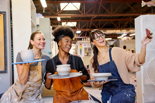Friends Enjoy Pottery Class and take a selfie