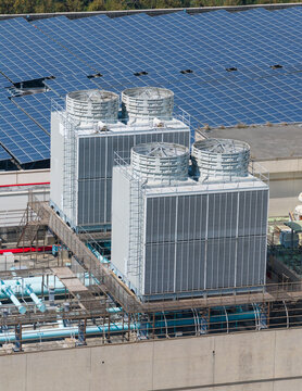 Industrial Rooftop Cooling Towers with Solar Panel Array