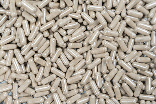 Many herbal supplement capsules for health and wellness