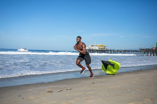 Beach sprint with resistance parachute.