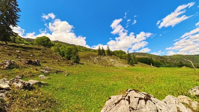 4K Timelapse alpine video with moving clouds at Kaiserbachtal valley, Griesenau, Wilder Kaiser, Kitzbuehel, Tyrol, Austria