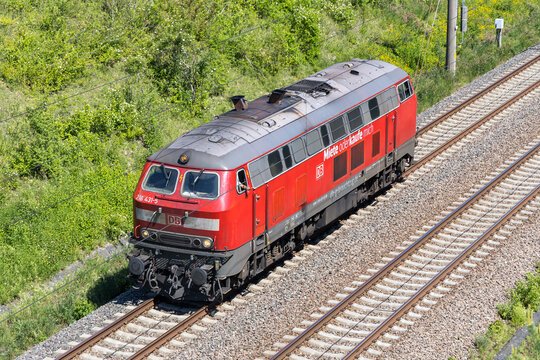 Diesel locomotive Class 218 of Deutsche Bahn DB on railway line Mannheim-Stuttgart in Moeglingen, Germany