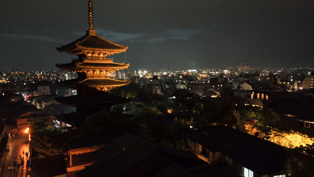 Kyoto&rsquo;s ancient Yasaka Pagoda seen from above under soft night illumination