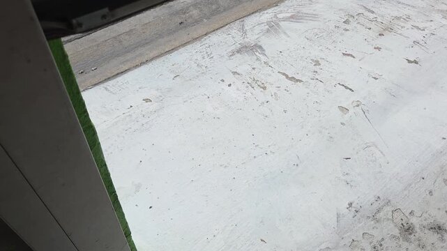 Low Angle View of Metal Roller Shutter Garage Door Opening