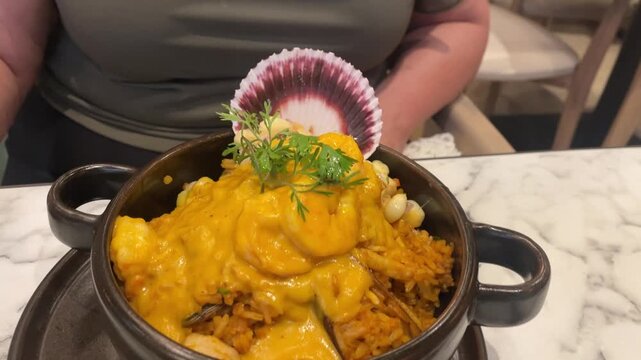 Curry dish served in dark ceramic bowl