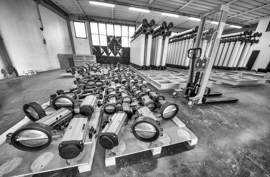 Warehouse containing water treatment machinery and industrial filtration systems indoors