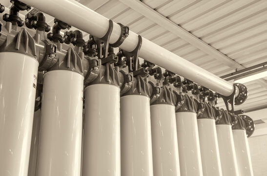 Warehouse containing water treatment machinery and industrial filtration systems indoors