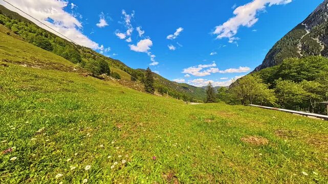 4K Timelapse alpine video with moving clouds at Kaiserbachtal valley, Griesenau, Wilder Kaiser, Kitzbuehel, Tyrol, Austria