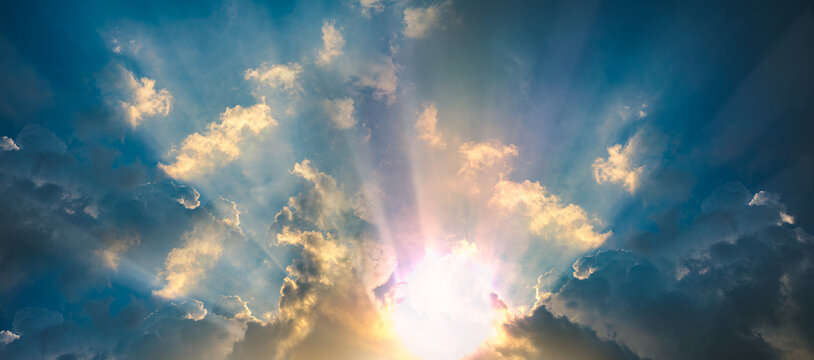 space place supernova Beautiful sunlight streaming through dramatic clouds, creating crepuscular rays in a blue sky. Nature background with hope, inspiration, weather, and heavenly atmosphere concepts