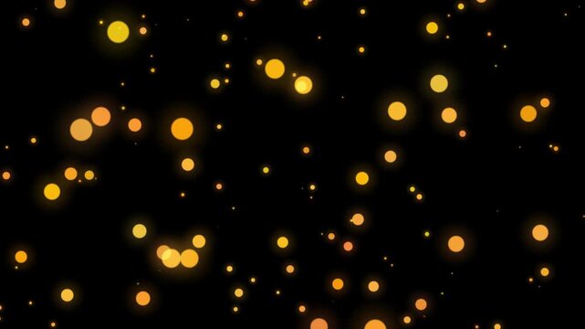 Abstract golden glowing bokeh particles floating on dark background animation