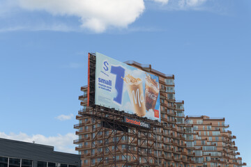 Naklejka premium McDonald's Canada advertisement on spectacular billboard near Queens Quay E, East Bayfront area, Toronto