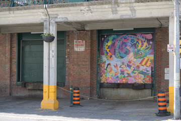 Fototapeta premium mural on receiving doors at St Lawrence Market, south building, The Esplanade and Jarvis St side, Toronto