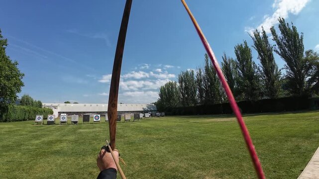 First person point of view archery practice aiming at target