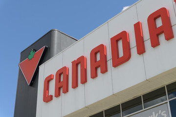 Fototapeta premium exterior building and sign of Canadian Tire, a department store, located at 1025 Lake Shore Blvd E, Toronto