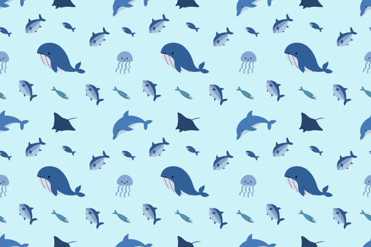 Seamless ocean wildlife pattern with whales, dolphins, jellyfish and manta rays on a light blue background