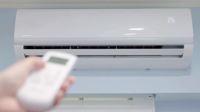 Turning on Wall Split Air Conditioner to 26 Degrees with Remote Control