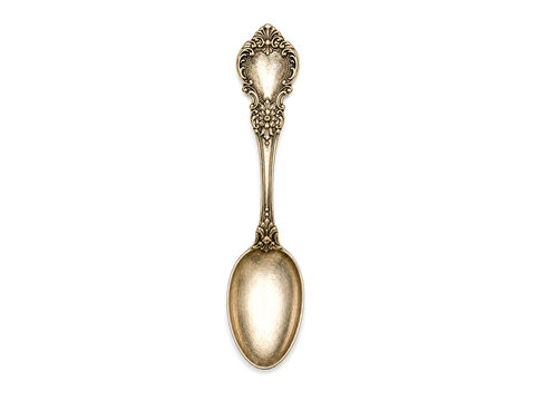 Fancy vintage spoon isolated on white background.