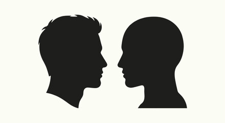 Fototapeta premium Two human head silhouettes facing each other on a white background