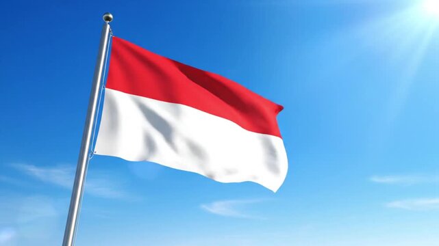 National flag of Indonesia waving against a bright blue sky