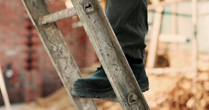 Shoes, construction worker and walking on ladder for building development, maintenance or renovation. Person, safety boots and climb at site for infrastructure, builder and industrial inspection
