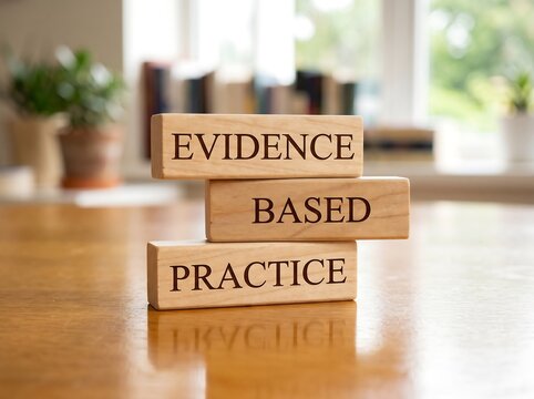 Wooden Blocks with Evidence Based Practice on a Desk