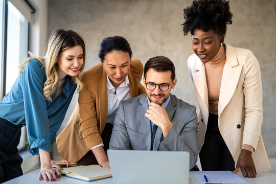 Multicultural business professionals in office, teamwork to achieve corporate success together