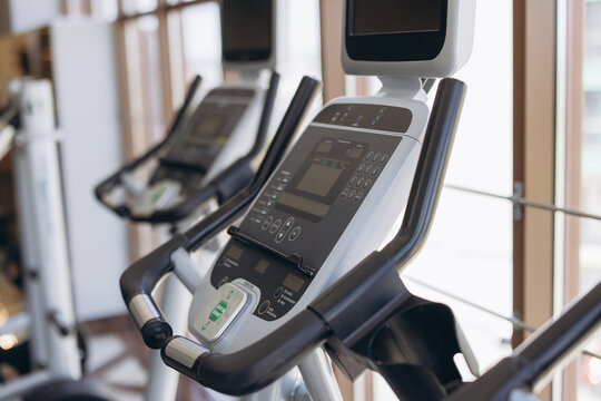 Fitness center featuring modern elliptical trainers and cardio equipment for health and wellness workouts