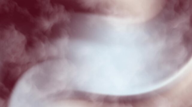 Soft maroon smoke clouds swirling in dreamlike waves, creating hazy abstract patterns, suitable for backgrounds, art prints, and design projects