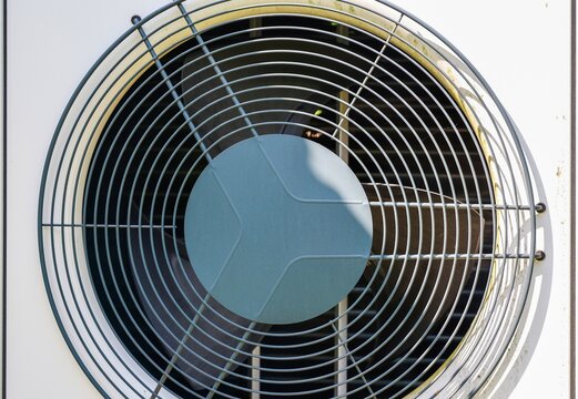 Outdoor air conditioning unit fan grill cooling home