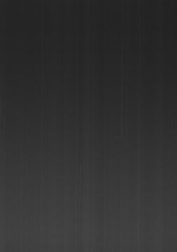 Dark scanning texture featuring subtle dust particles, fine vertical scan lines, grain, and aged surface imperfections. Ideal as an abstract background, overlay, grunge texture.
