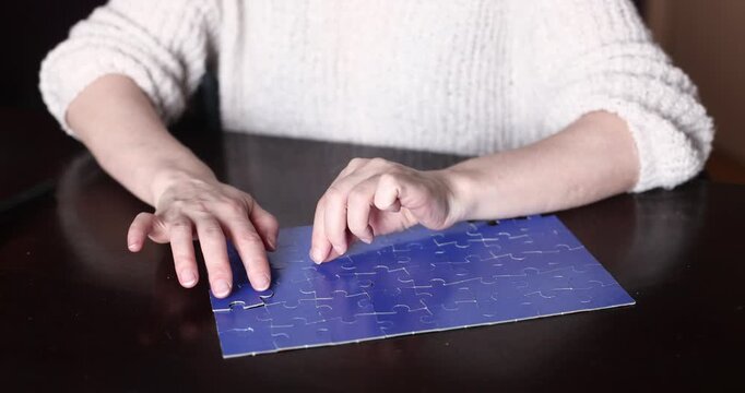 Blue velvet surface with a single jigsaw puzzle piece on top