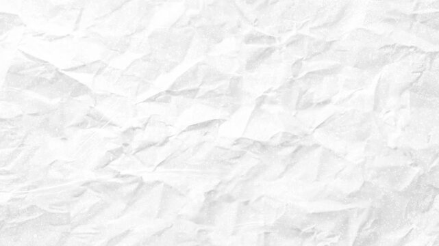 Crumpled white paper texture video transition with stop motion effect and grainy overlays.