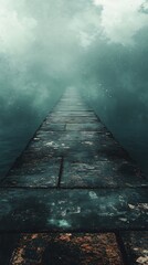 Obraz premium A long weathered pier extends into a vast dark misty sea under a faintly starry sky