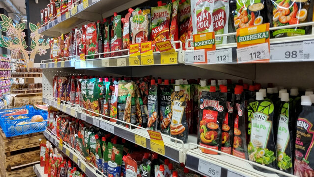 Retail Shelf Management and Product Placement in Supermarket Condiment Section, Editorial