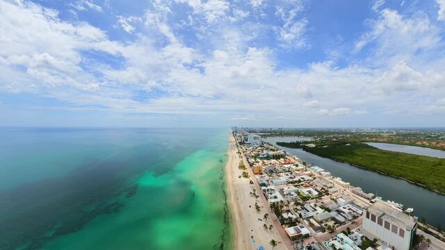 Aerial pullout shot Hollywood Beach Florida rear view