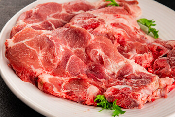Obraz premium Raw pork steak pork tenderloin, food preparation lunch or dinner tasty organic snack fresh farm product delicious gourmet food background on the table rustic food, top view copy space