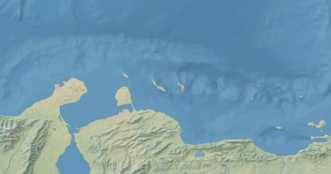 Curacao on Globe. Zoom into the country with Earth spinning on dark background. Physical world map with Curacao and label on it. Country view animation.