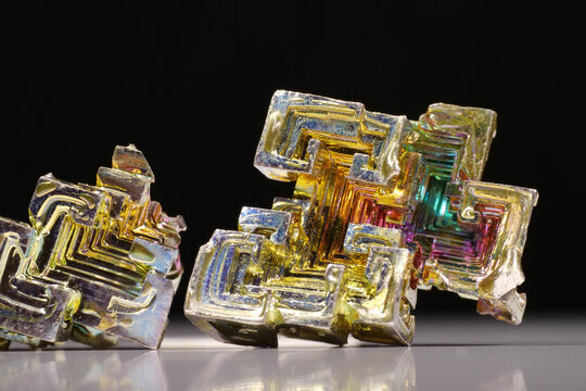 Bismuth crystals. Bismuth - chemical element with symbol Bi and atomic number 83