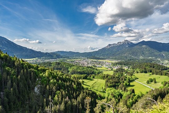 Panoramic View of Reutte Valley from Fort Claudia, Scenic Alpine Landscape with Mountain Peaks, Green Forest, Fields and Town in Tyrol Austria, Nature Travel and Hiking Destination Background
