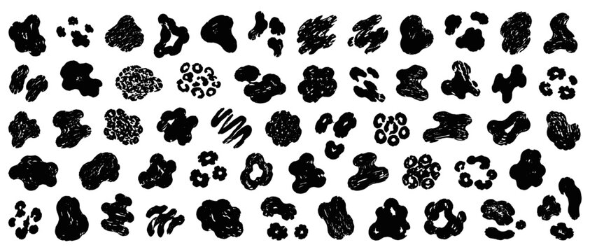 Bold black animal fur spots pattern with swirling brush marks, textured crayon blobs and abstract skin silhouettes vector set