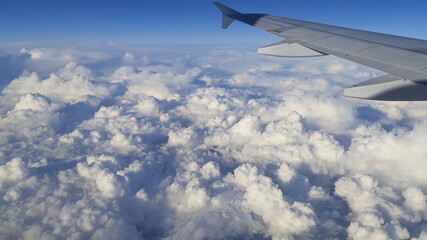 Fototapeta premium clouds seen from the sky while flying in an airplane