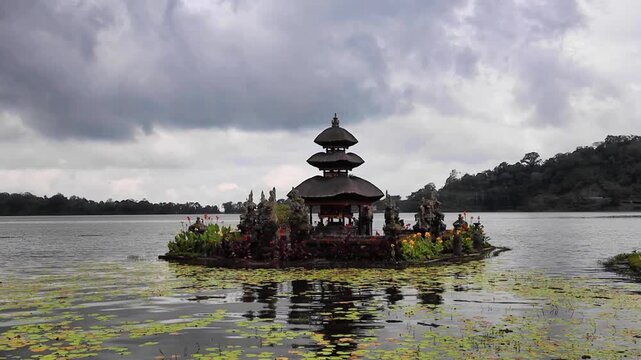 Pagoda at Beratan Water Temple on cloudy day in Bali, Indonesia 