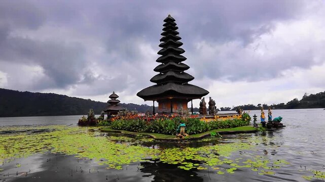 Pagoda at Beratan Water Temple on cloudy day in Bali, Indonesia 