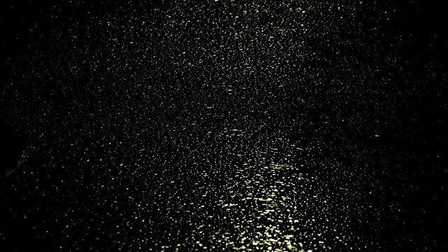 Tokyo,Japan - June 3, 2026: Heavy rain falling on a street surface at night
