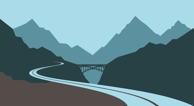 A winding road curves through a valley with a bridge over a canyon and mountains
